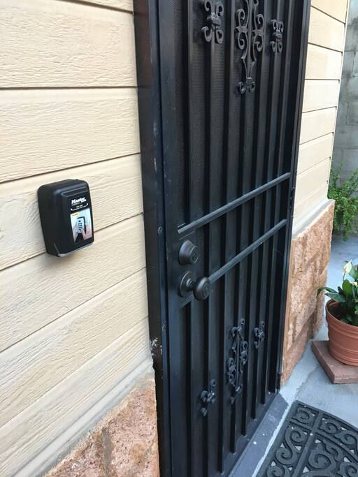 Lockbox is located on the left side of the door for access.