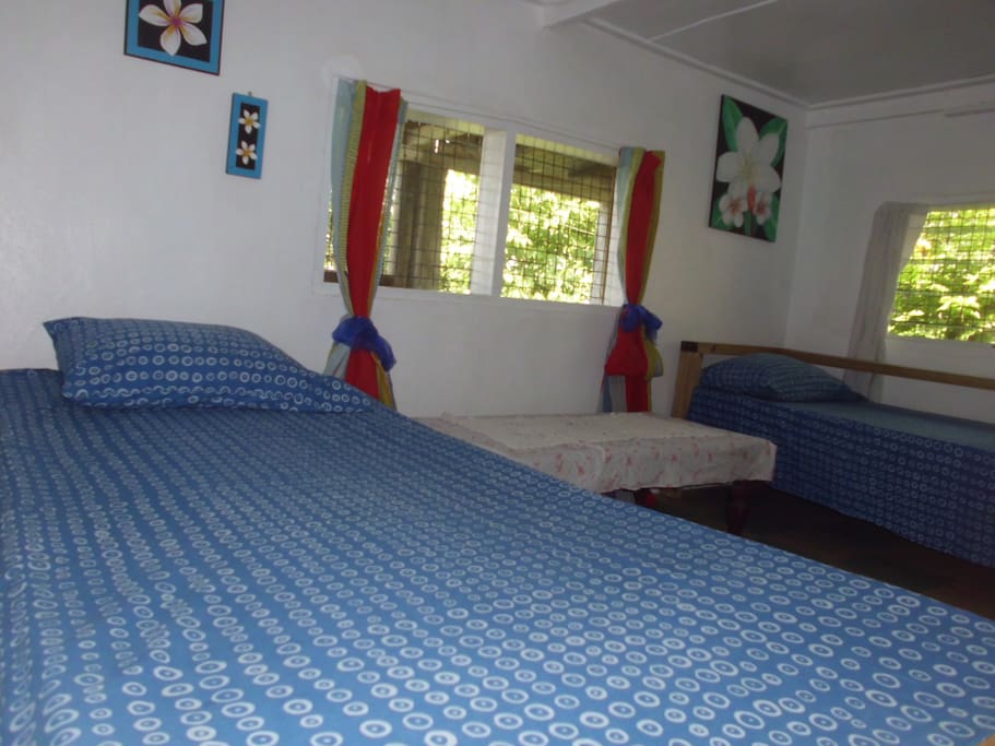 With bookings for 4 people a single bed is brought in and the lounge area is converted to be part of the bedroom.