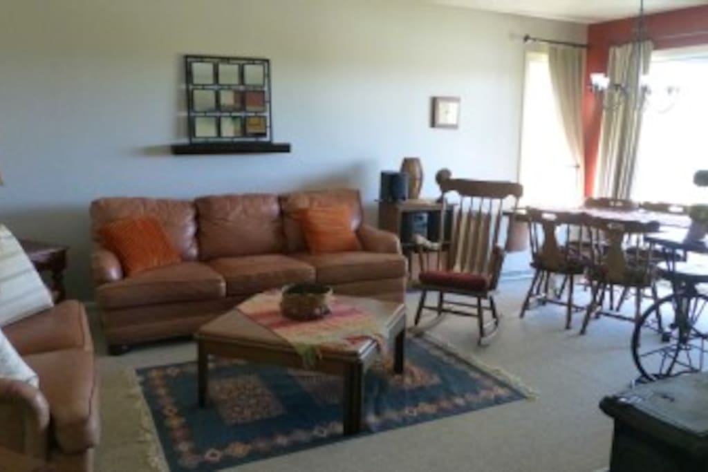 Living and dining area opening out to spacious deck with awesome view.