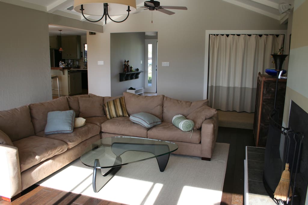 Living room w/fireplace. Walk onto deck from kitchen, living room, bedrooms