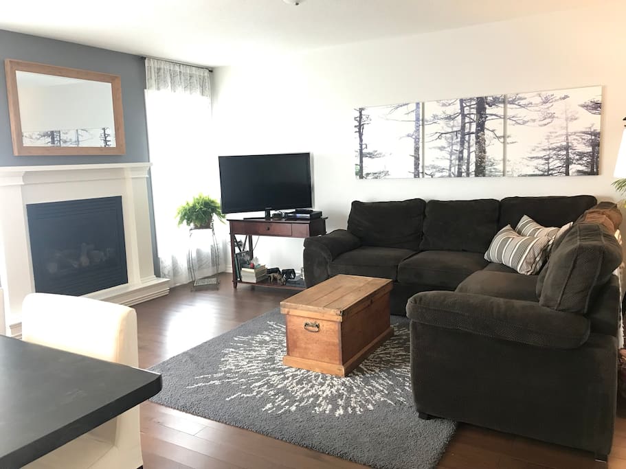 Family room with large sectional and gas fireplace
