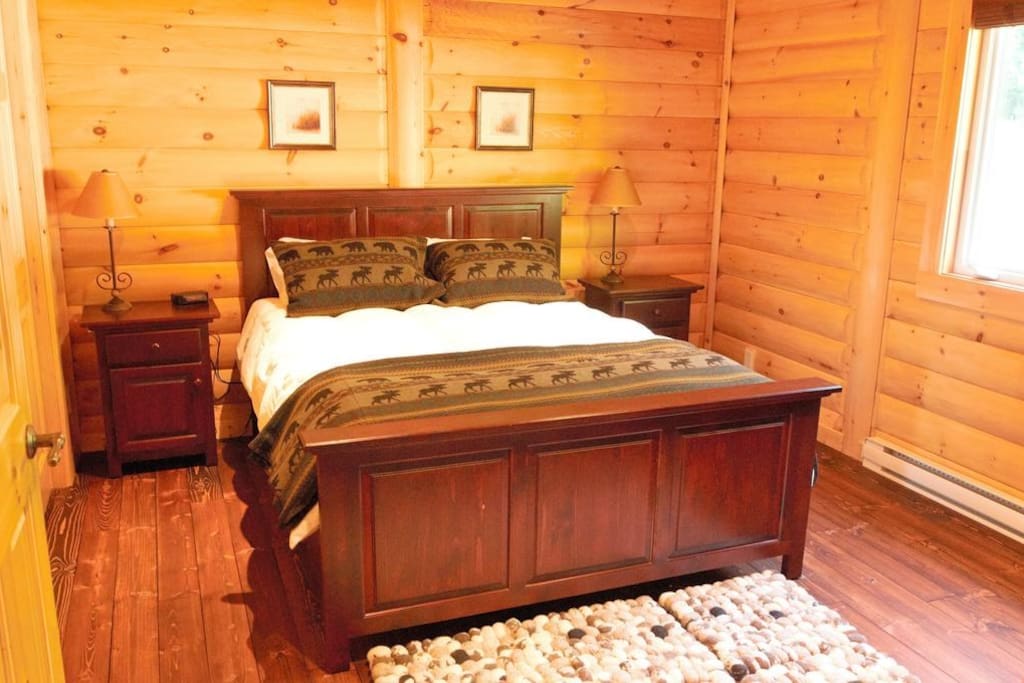 Sink into the comfortable queen bed in the master bedroom after a day outside.