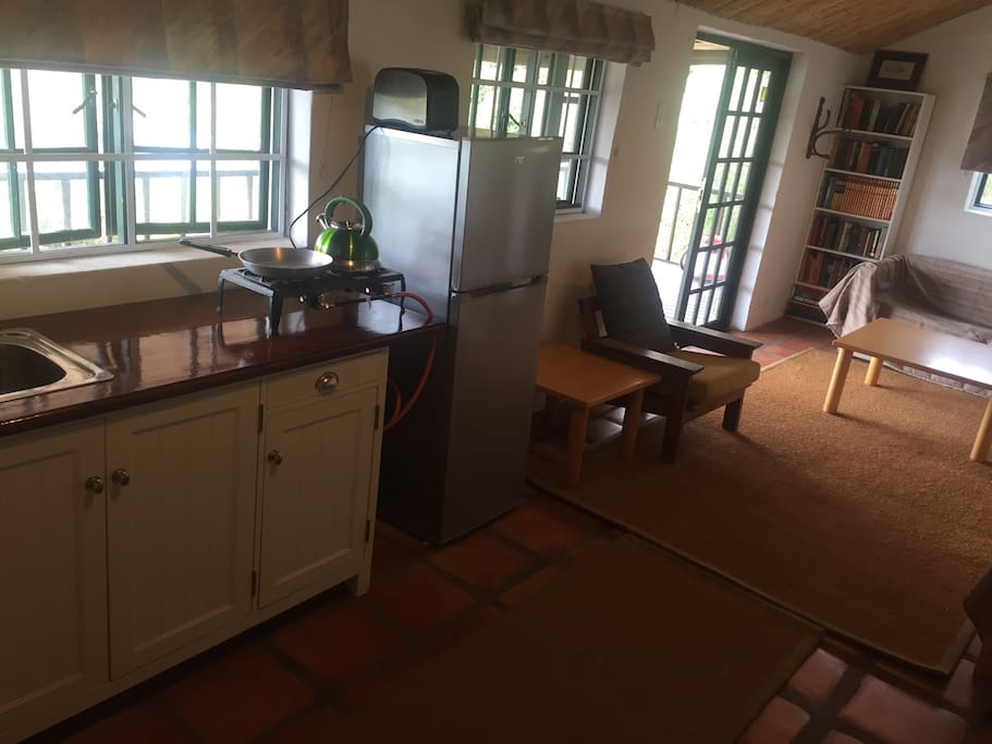 View from inside the cottage with basic kitchenette.