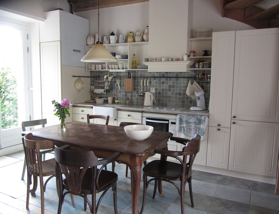 Fully Equipped Kitchen with dining table