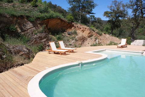 Large house surrounded by nature
