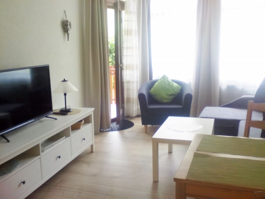 Wohnzimmer mit Balkon