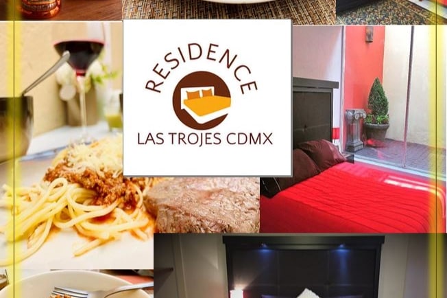 A collage of features from the residence includes a dining area set with plates and cutlery, a close-up of a pasta dish, a glass of red wine, and a cozy sleeping area with red bedding. A vibrant outdoor space with plants is also visible.