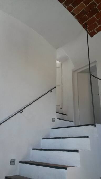 stairs to apartment and guest room
