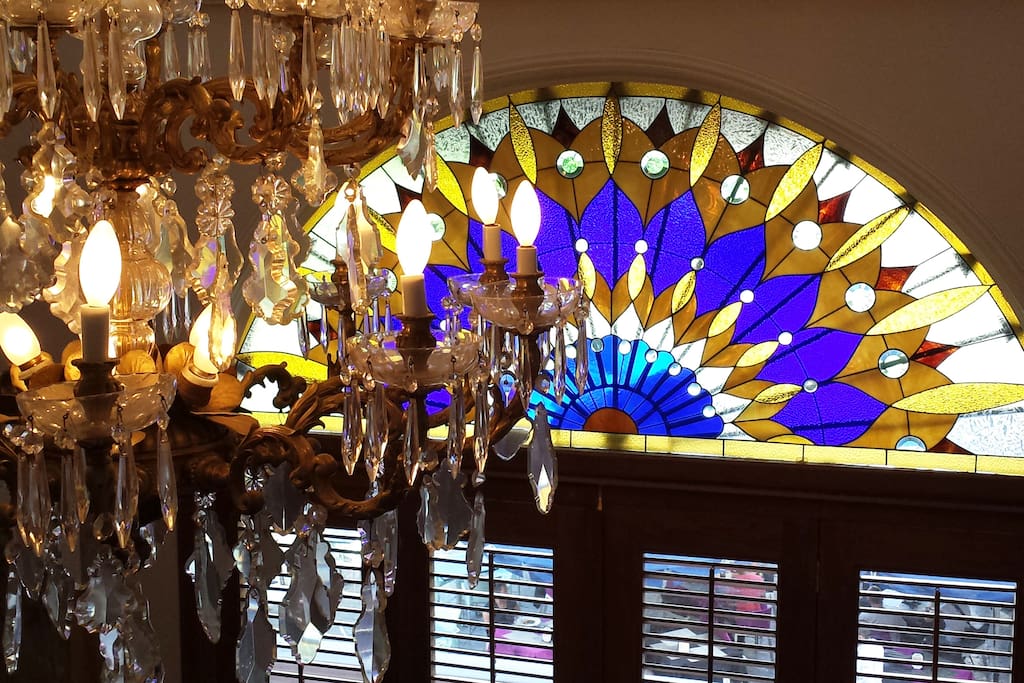 Living room - chandelier & stained glass window
