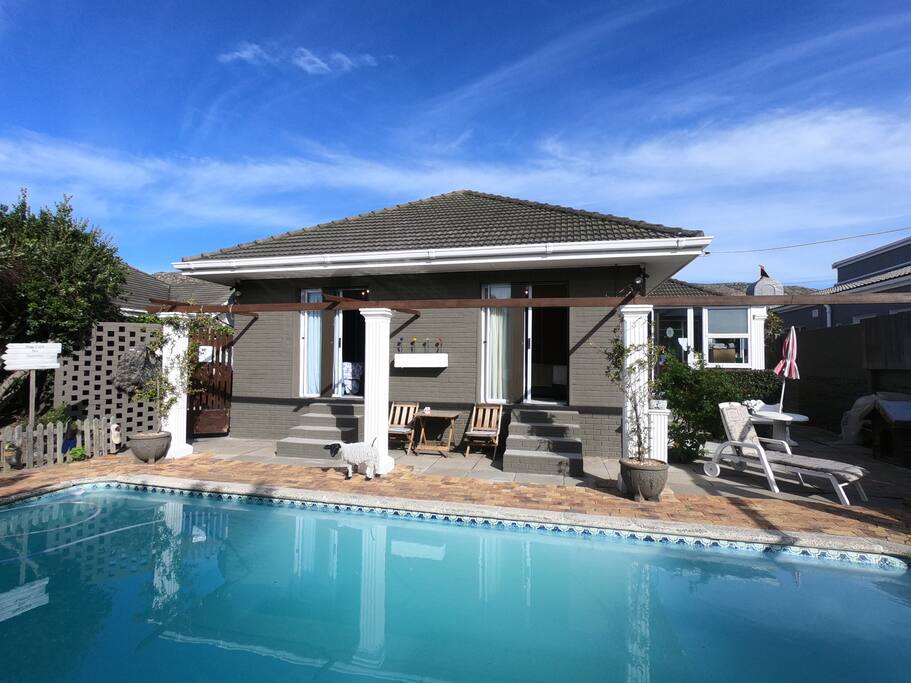 Brown room entrance to pool