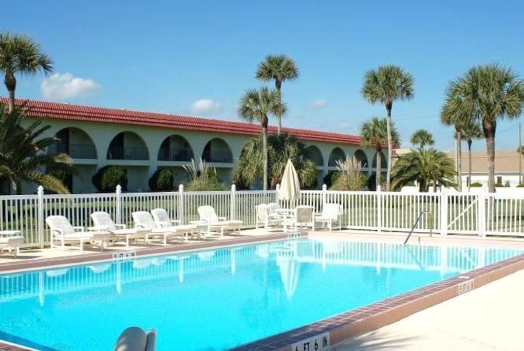 Lounge by our Ocean Club pool & enjoy the sunshine! - Our Ocean Club pool is fenced to keep the little ones safe so everyone can