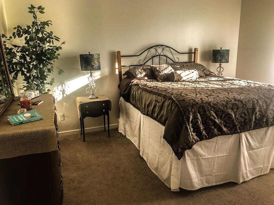 A comfortable, clean bed with crisp sheets and fluffy pillows awaits. Enjoy a great rest.