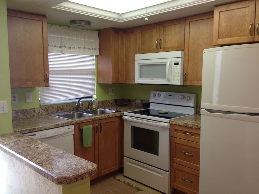 Fully equipped kitchen with everything you could need for cooking, baking, and serving 12.
