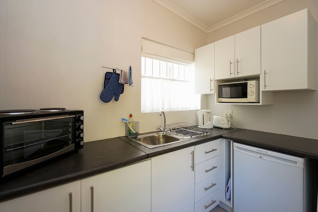 A spacious kitchen with everything you need to prepare meals