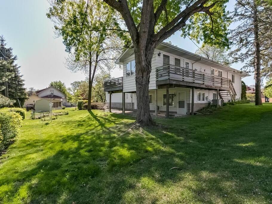 Back of the house with walk-out basement to private yard