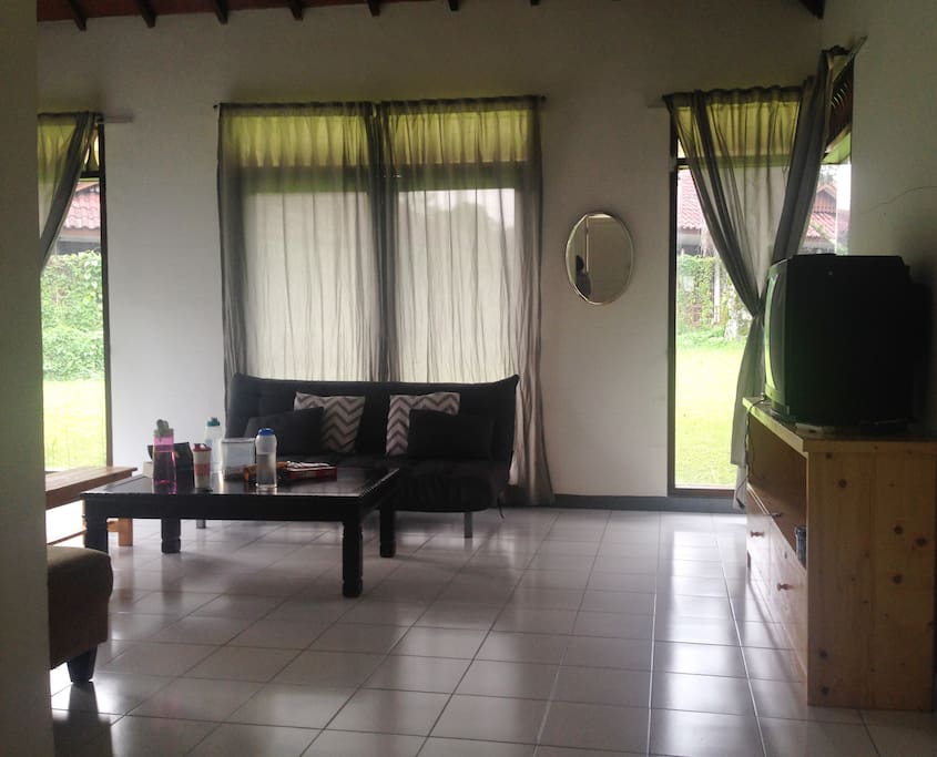 lounge area with glass door that open to the backyard