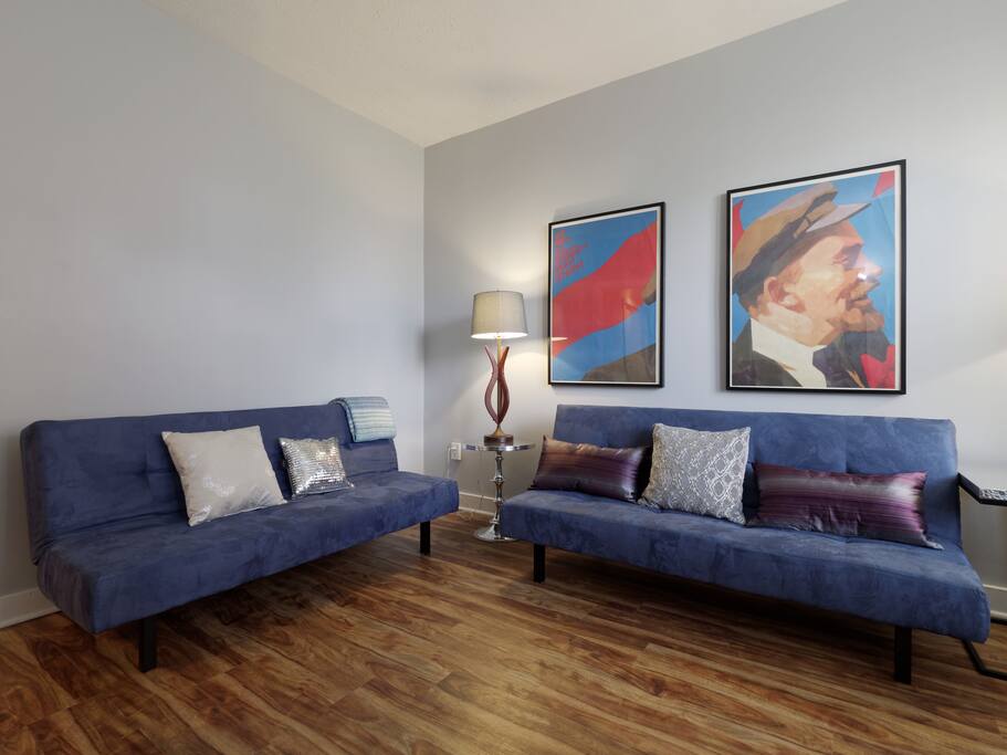 Both sofas turn into sleep spaces for one person.