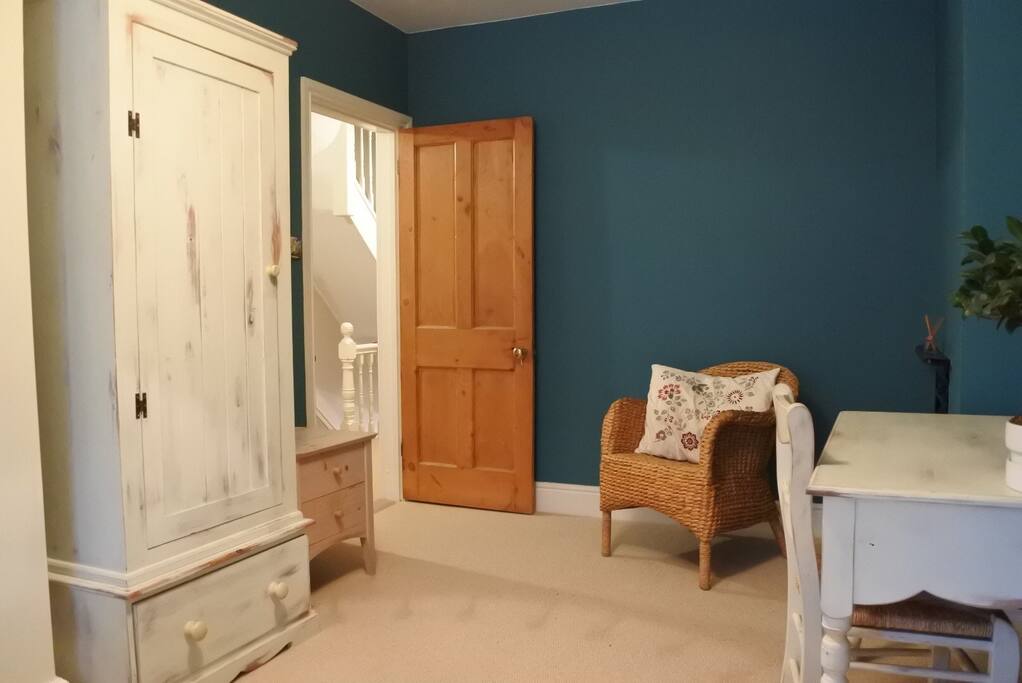 Bedroom - wardrobe, desk and sitting area