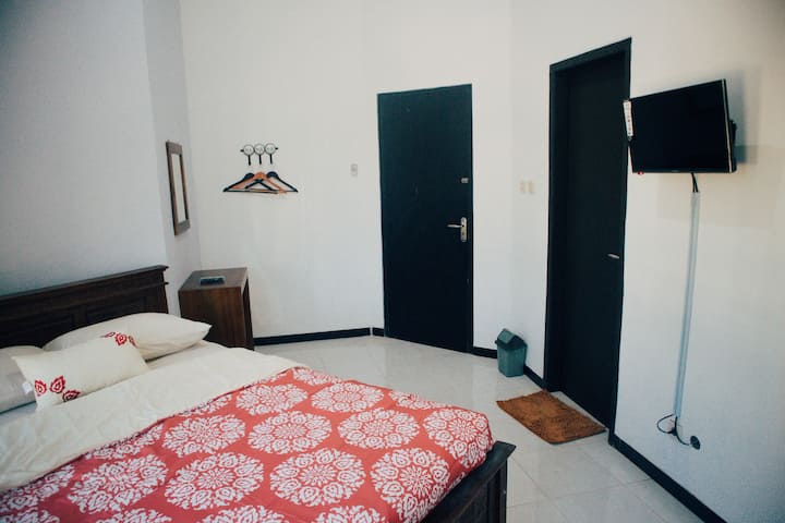Ayana Room : Queen Size Bed, Air Conditioner, Bathroom (shower), 24" Flat TV,  Dresser , garden view 