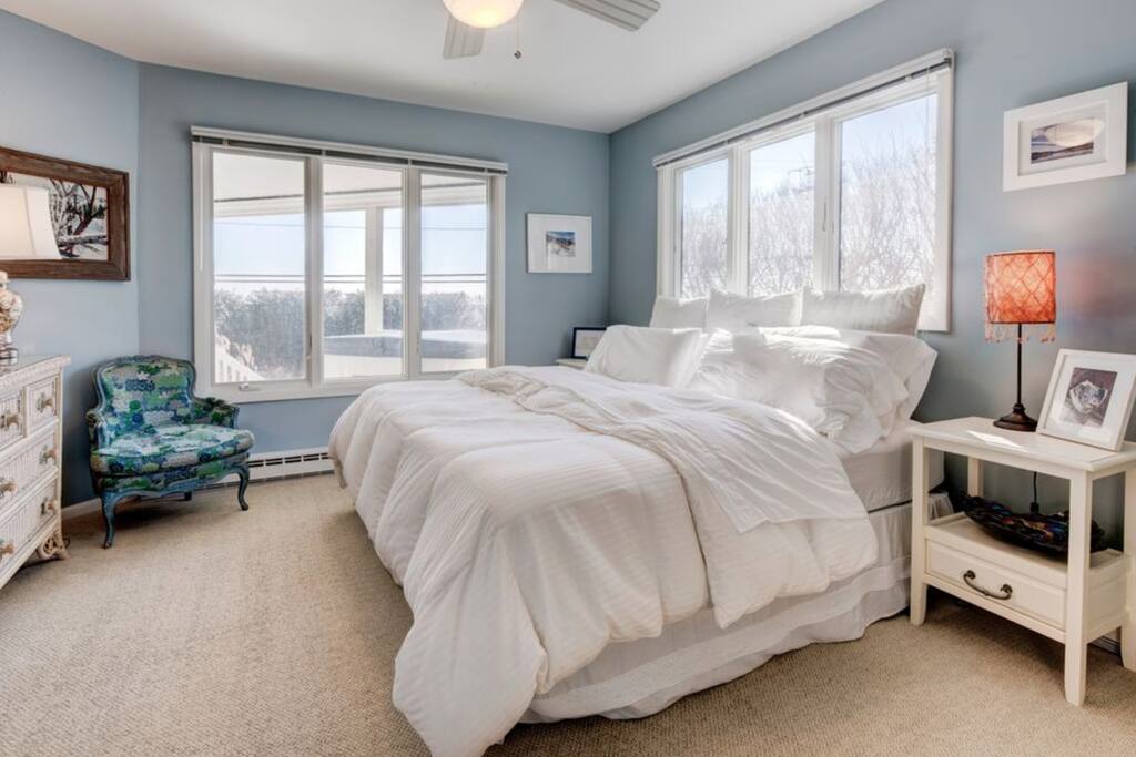 One of two bedrooms on first floor with king bed