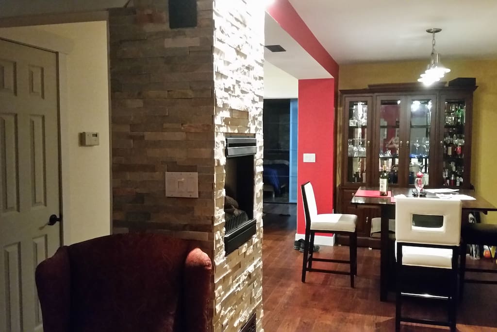 View of the dining room from the living room. You can even spot the bedroom at the back.