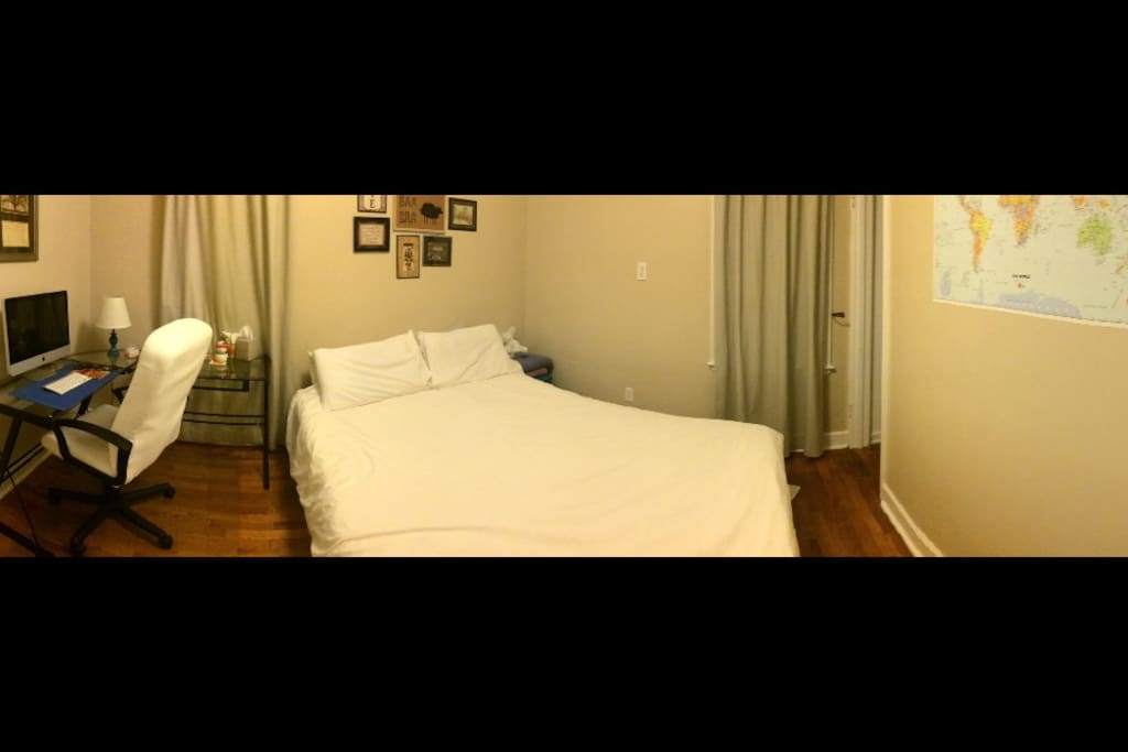 Bedroom with guest computer and closet space.