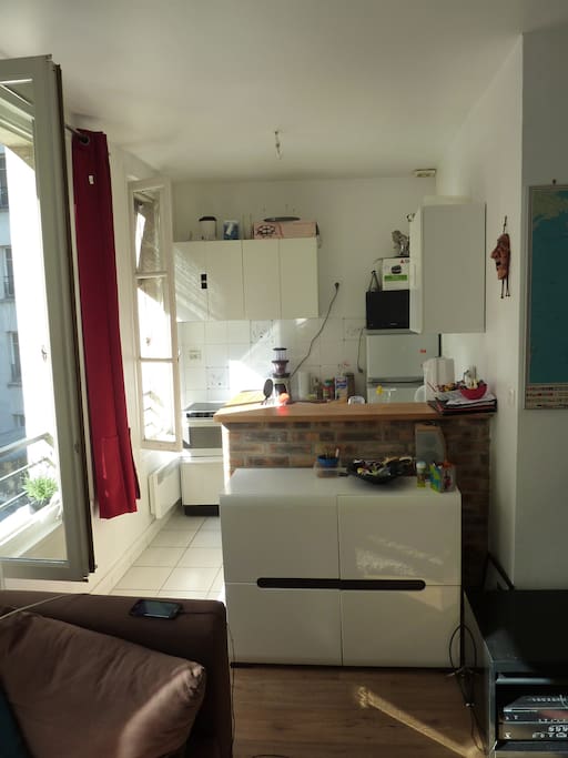 an open kitchen to remain with the rest of the family while cooking