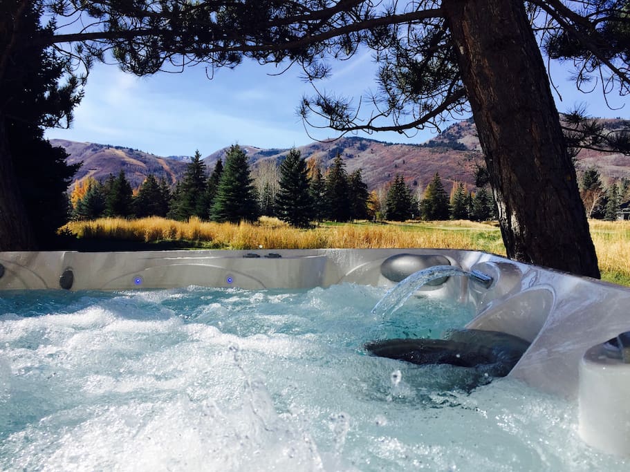 Brand New 7-Person Hot Tub with unbelievable ski mountain views situated VERY PRIVATELY overlooking the golf course