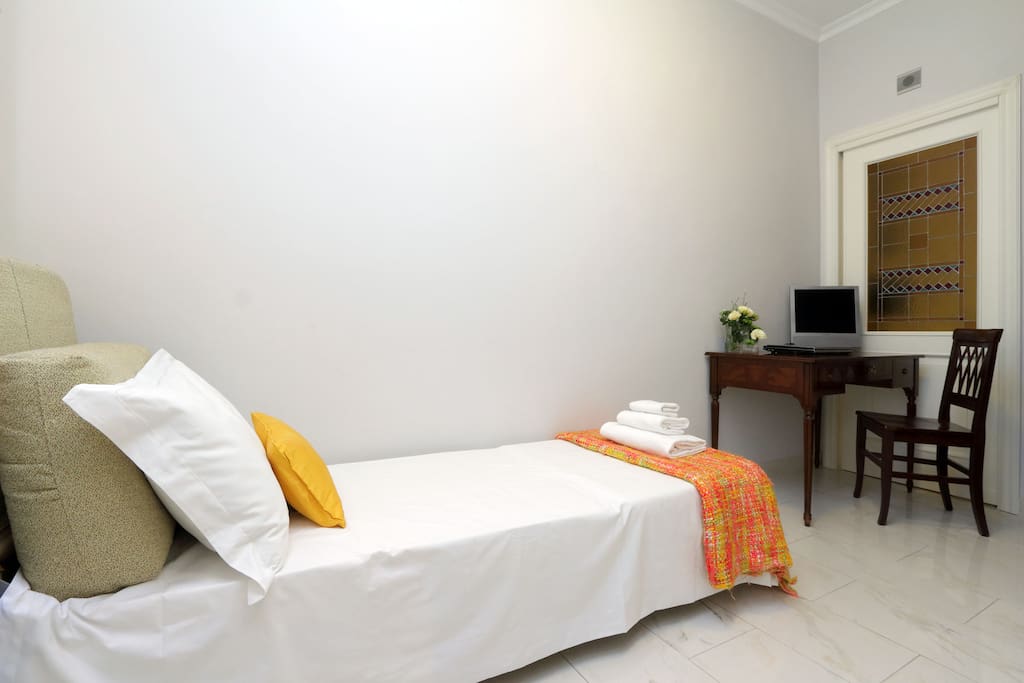 The small room with a single bed