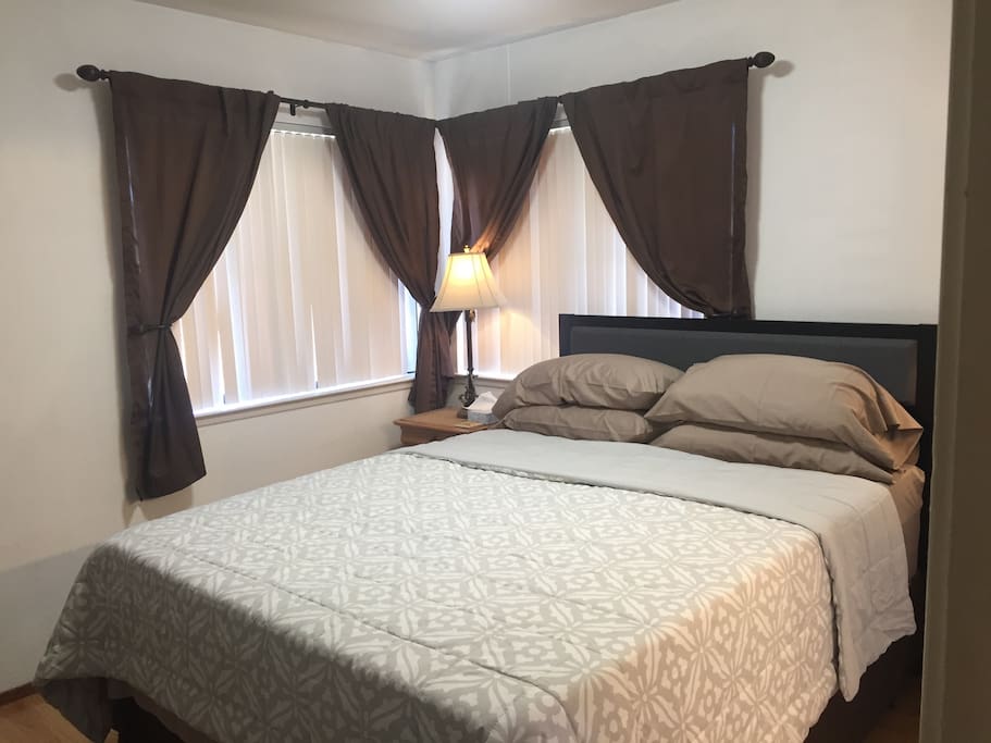 The room has room-darkening vertical blinds and dark curtains. The Queen-size bed is extra soft because of an additional 3-inch thick memory foam on top.