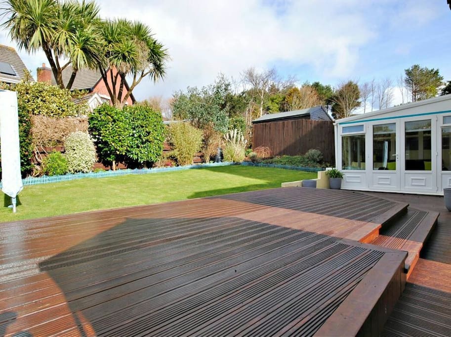 Rear garden, decking and conservatory, plus 6 seat patio set and charcoal BBQ