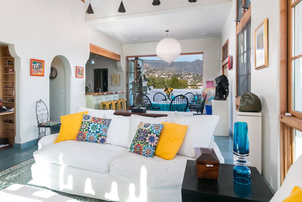 Relax in the chic, modern living area with seating for 5.