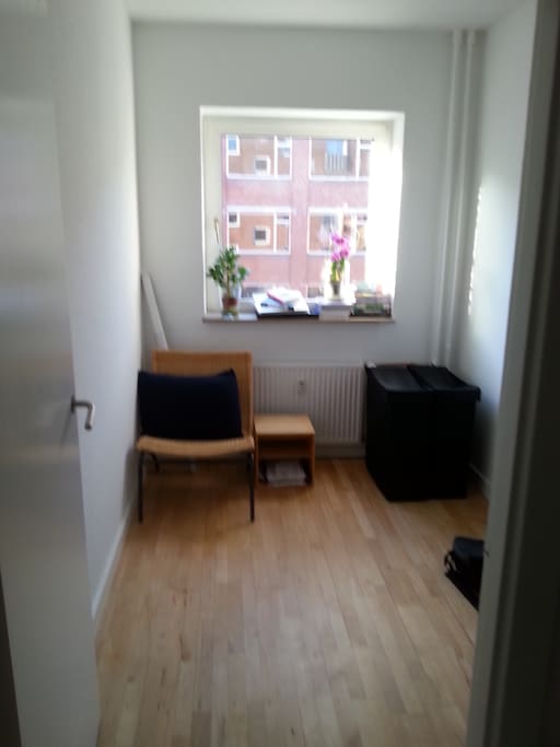 The small room. The desk in the corner is not in the photo, but normally used as an office.