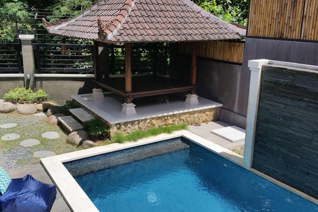 Upon entering the villa you will be greeted by the beautiful view of the pool & welcoming outdoor area