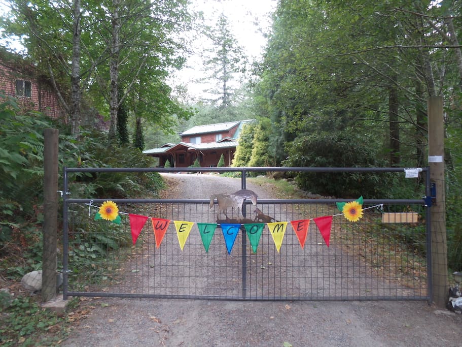 Entrance to the property: The High Lonesome. Host's house is on the right, Guest House on the left.