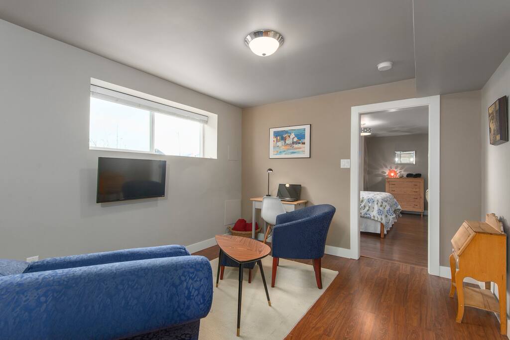Smart TV is on a swivel arm and can be oriented to the dining area.