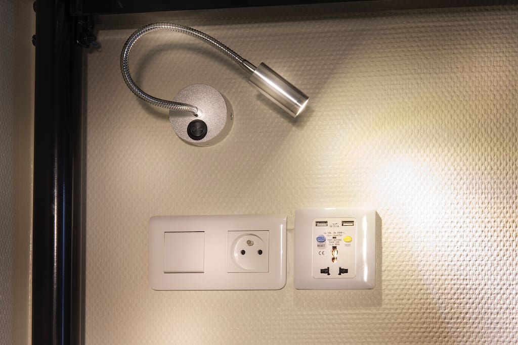 For each bed : Personnal LED light + international power plug