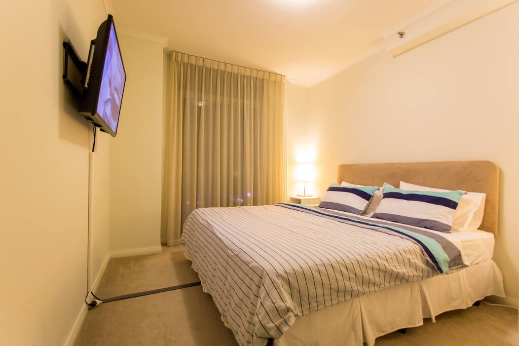 King Sized bed that can be separated into 2 long single beds.