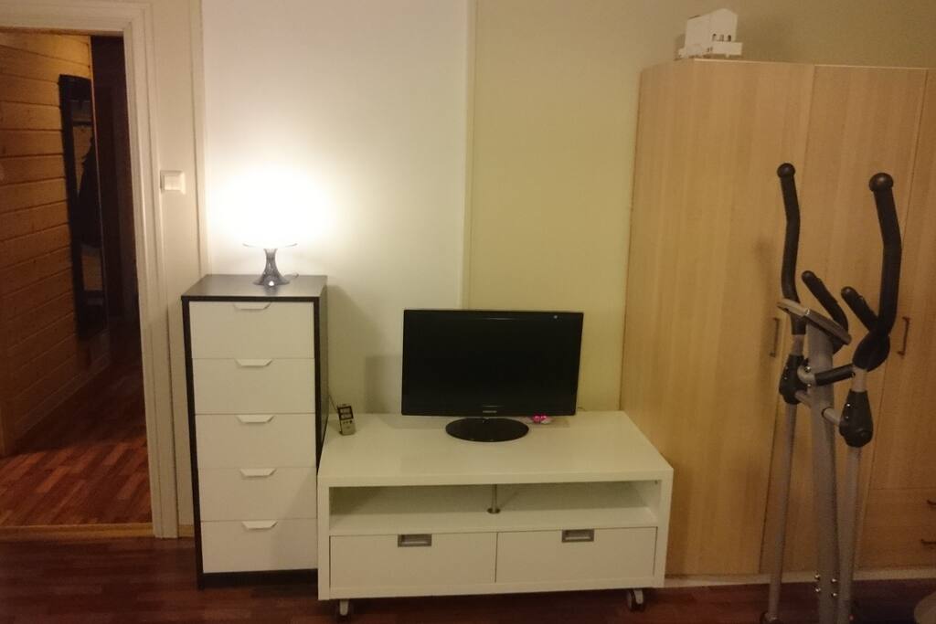 There is a TV and playstation 3 in the bedroom.