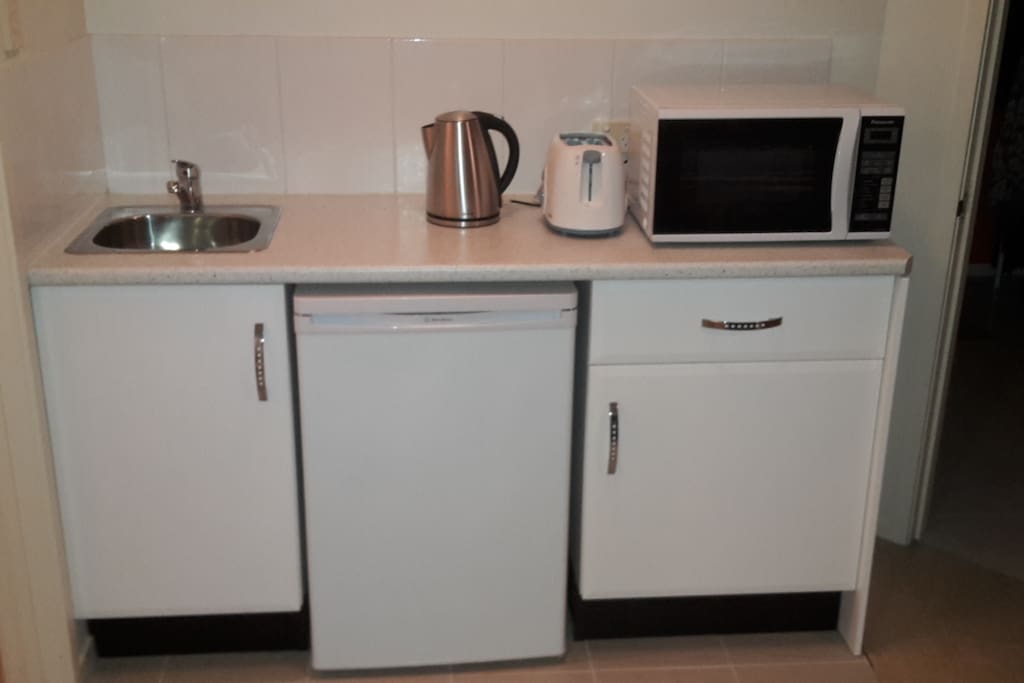 Kitchenette with Microwave,tea and coffee facilities and toaster