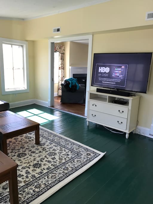 Large sun room with DishTV, Polk Bluetooth sound bar, DVD player and wifi internet access (streaming video access not available; satellite internet connection)
