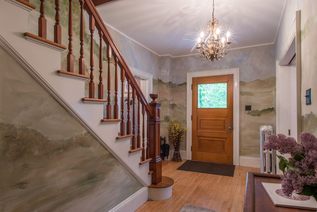 Front entry door to grand front porch