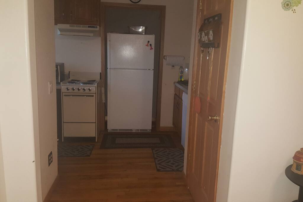 Kitchen w/small stove/oven, Refrigerator, Dishwasher, Microwave, Coffee Pot