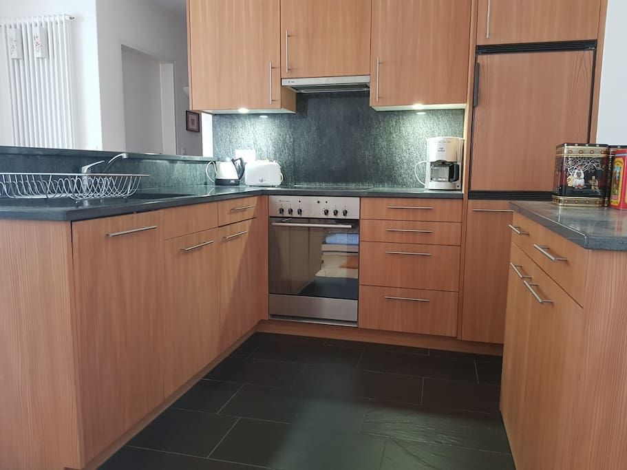 The mordern kitchen offers all you need. If you have guests for a dinner or want to celebrate theres a big Room with Kitchen to use downstairs