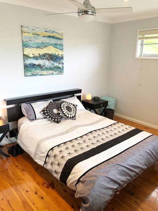 Main bedroom with queen bed,built in wardrobes and ceiling fan