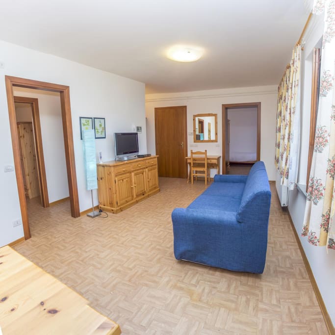 Soggiorno con divano letto per due persone