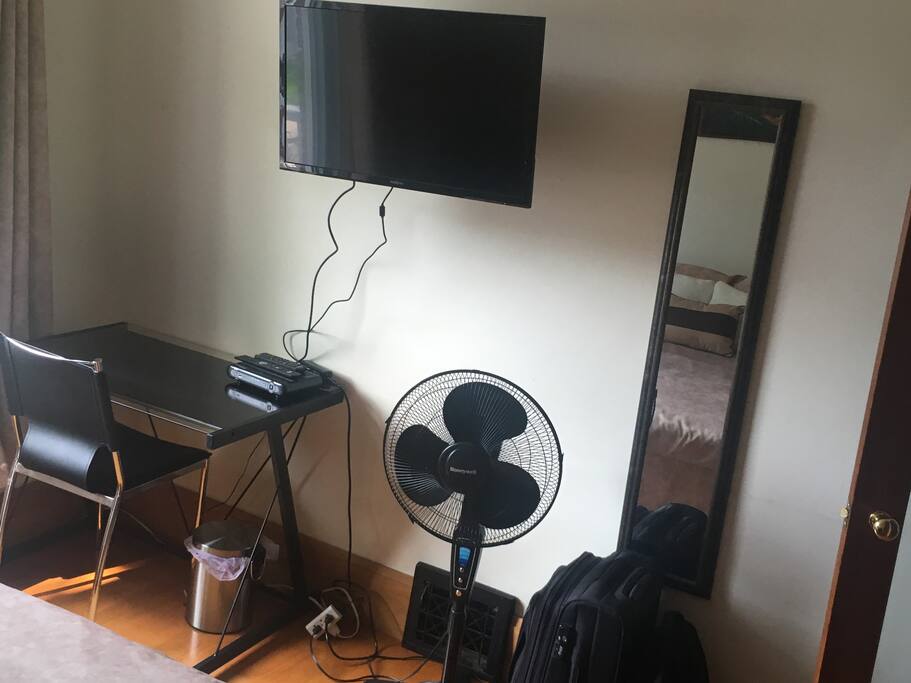 Desk for laptop
TV with cable.
