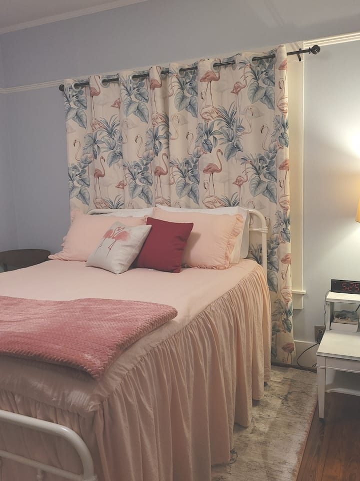 Front bedroom, Myrtles room, queen bed with cotton sheets, plenty of quilts, comforters and throws changed out after every guest leaves, closet, dresser drawers, full length mirror on inside closet door and shoe rack on back of entry door.