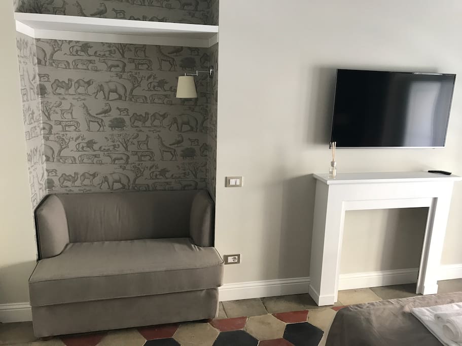 Vista divano e TV