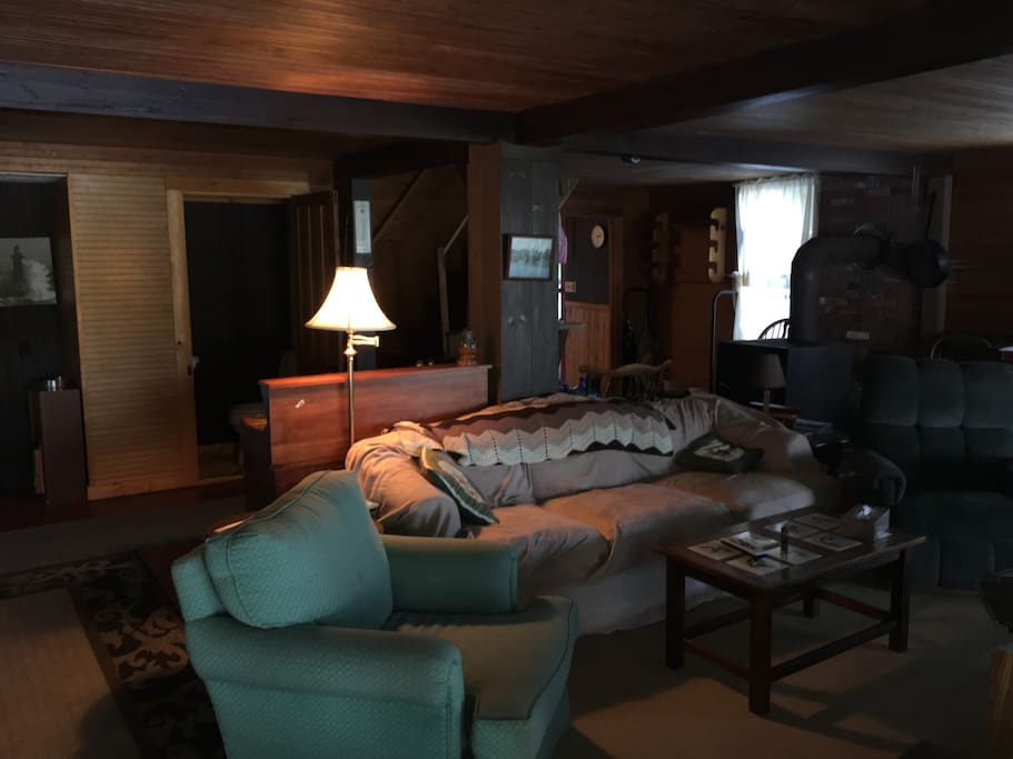 Living room, 1/2 bath in back